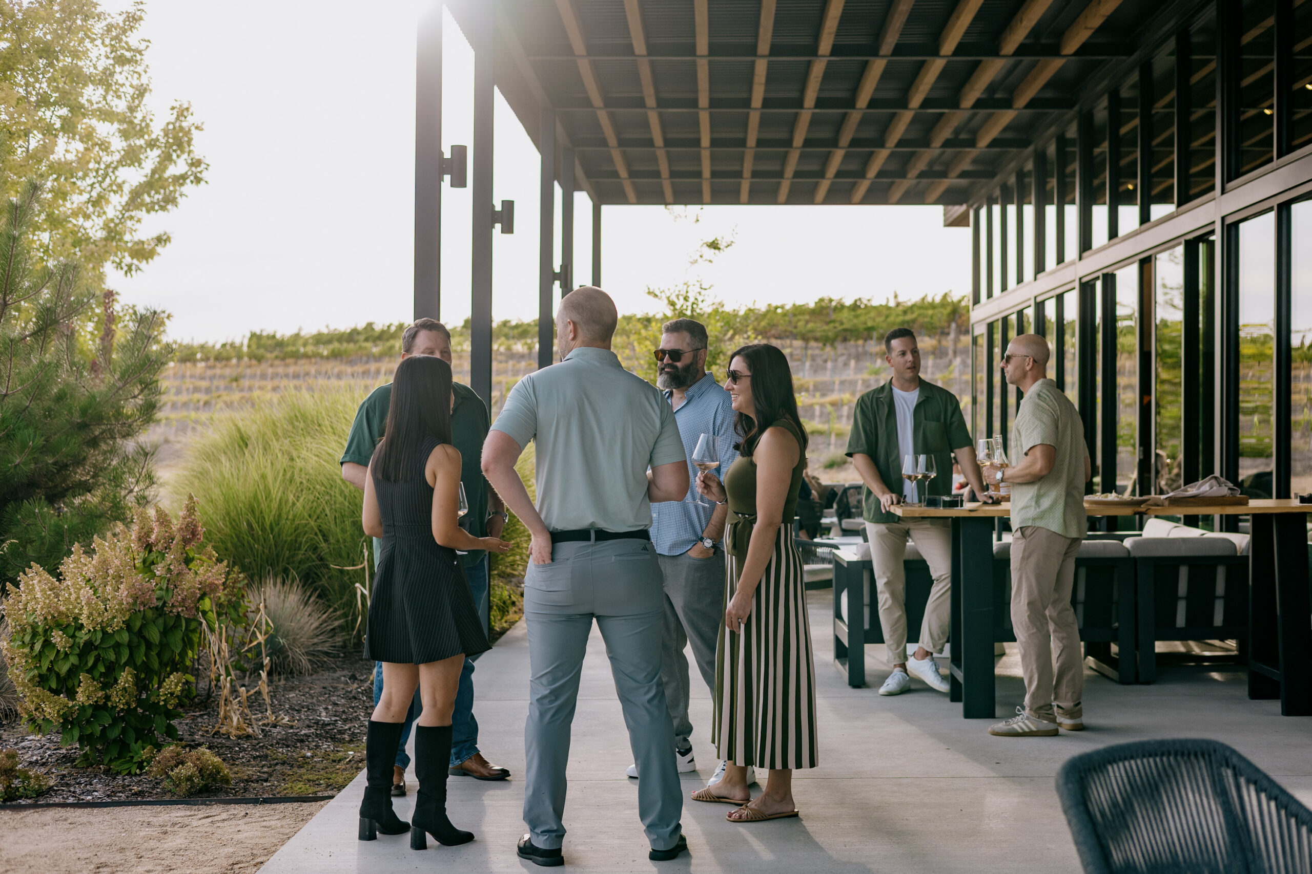 Guests chatting on the patio